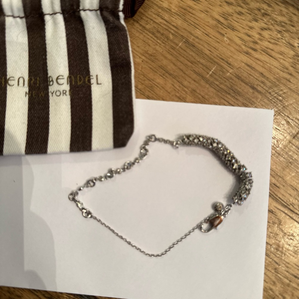 Gorgeous HENRI BENDEL Sparkly Rhinestone, Silver Infinity Bracelet - Picture 6 of 11